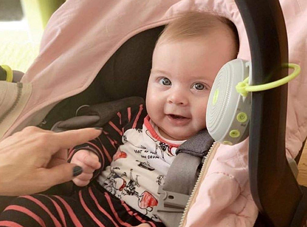 Marpac Hushh Portable White Noise Machine attaches to cribs and carseats for soothing white noise on the go.